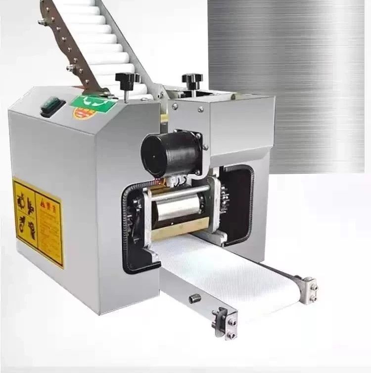 餃子皮。肉まん皮自動生産機